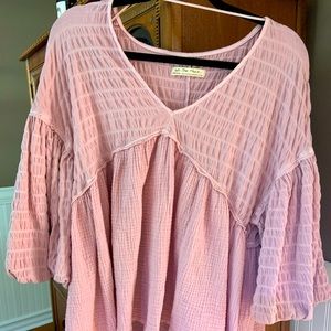 BRAND NEW, NEVER WORN. We the Free flowy shirt.